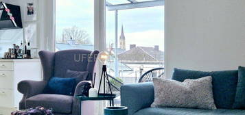 Lichtdurchflutete, moderne  3-Zimmer Dachgeschosswohnung mit großer Balkonterrasse