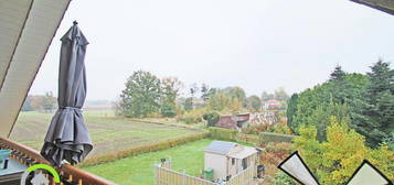 Große DG-Wohnung mit Blick ins Grüne in Oppenwehe.