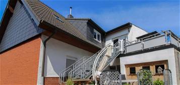 Charmante 3-Zimmer-Wohnung mit Kamin und Terrasse in naturnaher Lage in Grevenbroich-Neuenhausen