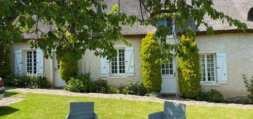 Appartement dans maison avec jardin commun