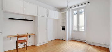 Appartement Paris 3 pièce(s) 59 m2 en rez-de-cour