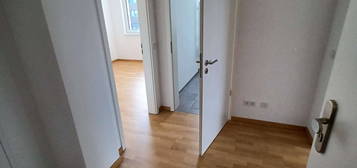 **Schöne 2-Zimmer-Wohnung im 1. Obergeschoss mit Balkon und Küche**