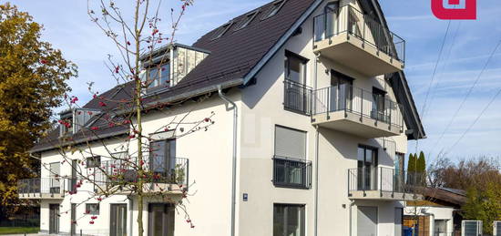 WINDISCH IMMOBILIEN - KfW 55-Erstbezug! Hochwertiges Appartment mit EBK und Balkon in ruhiger Lage!