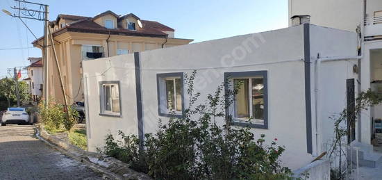 Deniz Manzarali ve Bahçeli Kiralık Daire