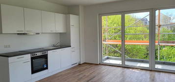 * 2 Zimmer in Neubau mit Balkon und EBK * SP mgl. * Bezug ab 12.2024 *