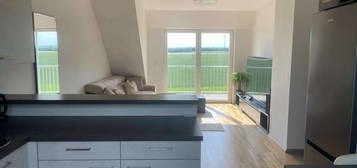 Helle 2 Zimmer Dachgeschosswohnung in ruhiger Lage