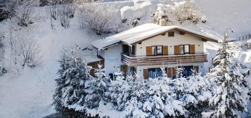 An incredibly rare mountain chalet for sale with pure 2nd home permission, set in a private, woodland location with direct ski-in / ski-out access