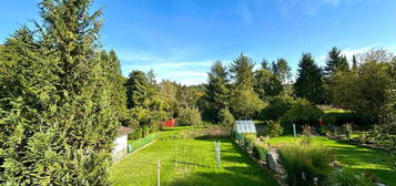 Leben im Grünen - Charmantes Einfamilienhaus mit Garage und herrlichem Weitblick!