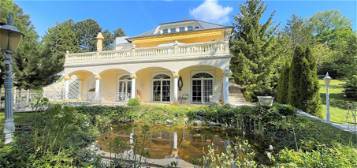 Exklusive Villa am Südhang mit herrlichem Panoramablick auf 1198m² Grund!
