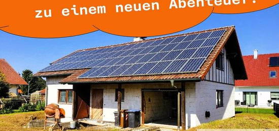 Grundstück mit Einfamilienhaus/Rohbau mit Photovoltaik-Anlage zum Kauf