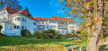 Exklusive Dachgeschosswohnung in historischem Gebäude mit Alpenblick!