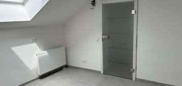 Erstbezug nach Kernsanierung mit Balkon: Geschmackvolle 3-Zimmer-Dachgeschosswohnung