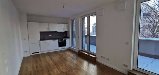 Ruhiges + helles Neubau-Apartment mit Einbauküche und Terrasse