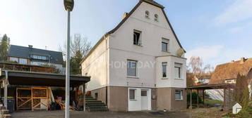 Einfamilienhaus mit ELW, Garten, Terrasse, Carports, Wintergarten und Dachterrasse in ruhiger Lage