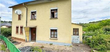 Trier-Olewig: Charmante Doppelhaushälfte in sanierungsbedürftigem Zustand mit Garten und Scheune