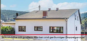 Traumwohnung mit großem, sonnigem Garten und geräumiger Doppelgarage!