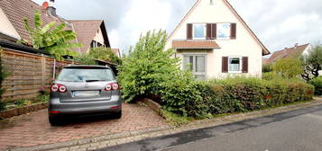 BERK Immobilien - Gepflegtes Siedlungshaus mit schönem Garten und Garage in bester Wohnlage