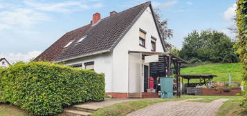 Vermietete Doppelhaushälfte mit Doppelcarport und Garage in Ritterhude