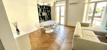 Appartement Haussmannien T4 en Duplex CARRÉ OR