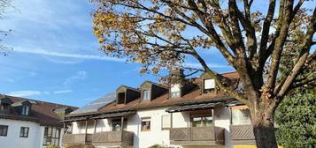 Hübsche 1-Zi.-Dachgeschosswohnung mit Loggia und Bergblick, zentral in Freilassing.