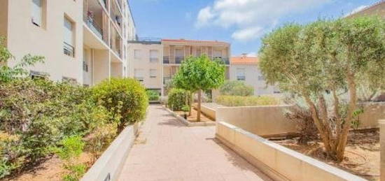 T3 de 54 m² en residence récente avec balcon et place de parking en sous sol