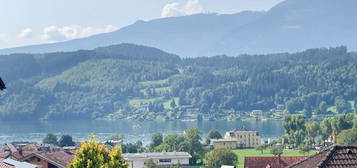 SEEBLICK DELUXE! EIGENTUMSWOHNUNG MIT GROSSZÜGIGER TERRASSE UND BERGPANORAMA INKLUSIVE.